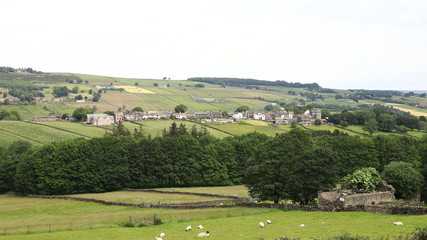 Fototapeta na wymiar West Yorkshire Countryside. The view across countryside towards the village of Stanbury in the parish of Haworth, West Yorkshire in Northern England.