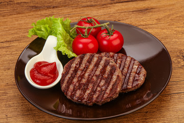 Grilled burger cutlet with sauce