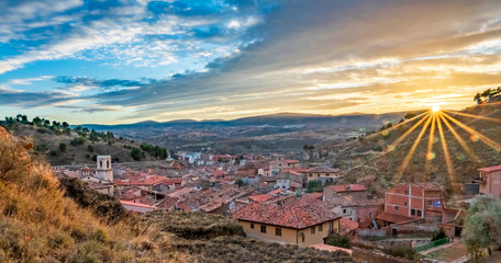 Sunset over Daroca antique village with tile roofs - obrazy, fototapety, plakaty