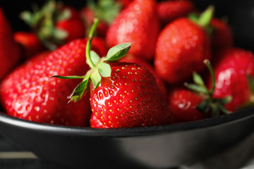Plate with ripe strawberry, closeup
