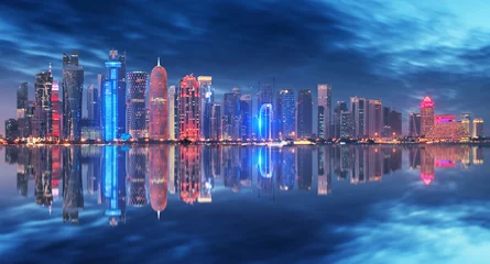 Fotobehang Skyline of Doha, Qatar during night © TTstudio
