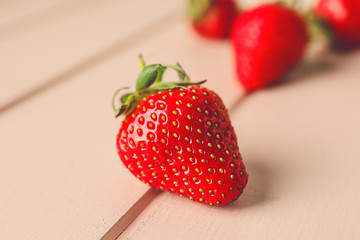Sweet ripe strawberry on table