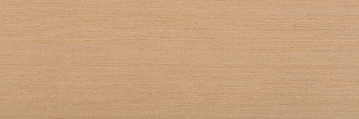 Light beige maple veneer background as part of your design. Natural wood texture, pattern of a long...