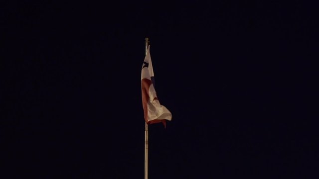 Panamanian Flag Seen Blowing in Wind While Transiting Gatun Locks in Panama Canal at Night