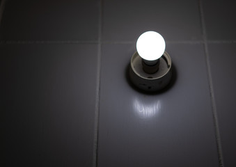 Round white LED in a modern style on a light background. Banner background. The element of the...