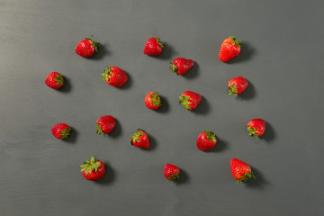 Top of view fresh strawberry on gray wall background.