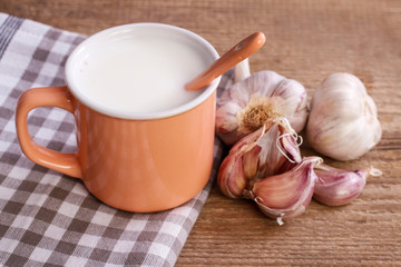 Natural remedy for flu: hot milk and garlic.