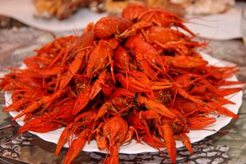 red boiled crayfish. many boiled crayfish. a lot of hot fresh boiled red crawfish