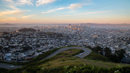 Pink Sky & view of downtown at sunset from Twin Peaks, San Francisco, California - San Francisco City from Twin Peak - Market Street and downtown San Francisco, seen from Twin Peaks