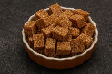 Cane sugar cubs in the bowl