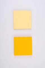 Two coloured stick notes paper isolated on white background