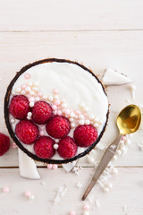 raspberry ice cream in coconut bowl on white background, exotic dessert, trendy smoothie bowl