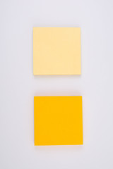 Two coloured stick notes paper isolated on white background