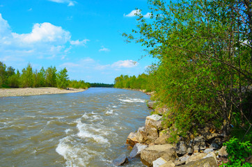 mountain river between sheer cliffs . blue clear water of the river.