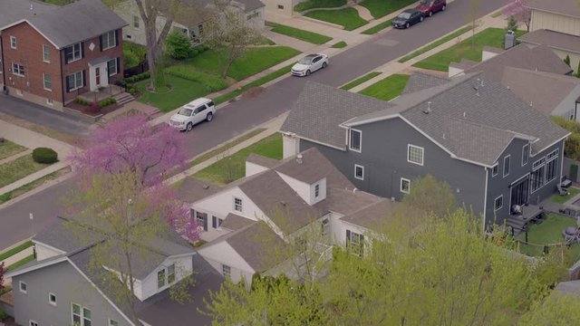 Rise Up Over Houses And Trees In A Nice Neighborhood In St. Louis In Spring.