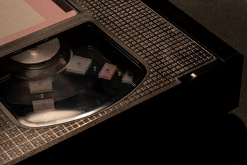 Video cassette VHS on the black background.