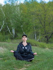 The girl is engaged in relaxation in nature