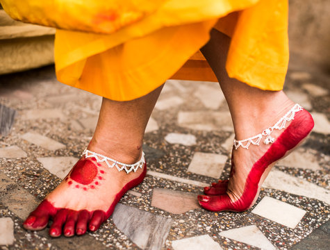 Alta design on feet of girl for hindu Indian wedding ceremony