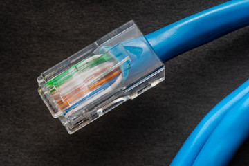 Network cable on black background.