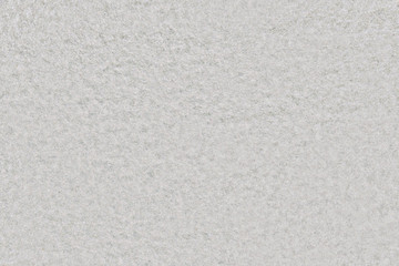 Texture of white foam material. Background felt of grey fabric with uniform pattern