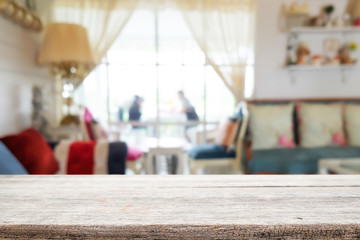 Empty wooden table space platform and blurred resturant or coffee shop background for product display montage
