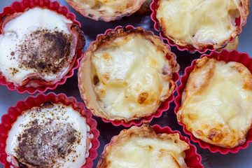 Delicious freshly baked tarts in red cups