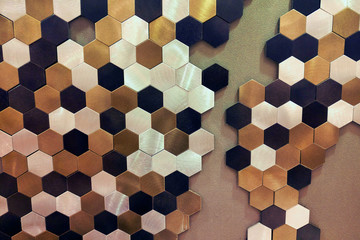 Hexagonal tile texture on metal surface