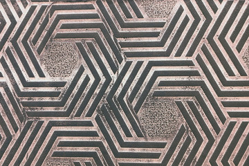 Surface texture with hexagon pattern of black geometric shapes