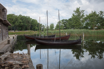 old viking boats laying in the lake in denmark