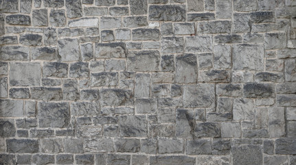 Old Medieval stone wall texture, with big gray stones