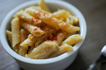 Tasty pasta bowl with parmesan.