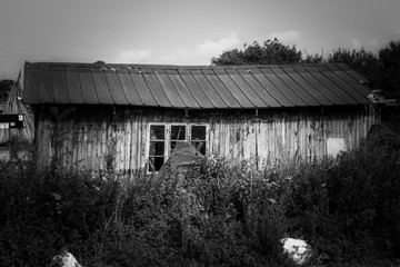 Old fishing house in black and white 