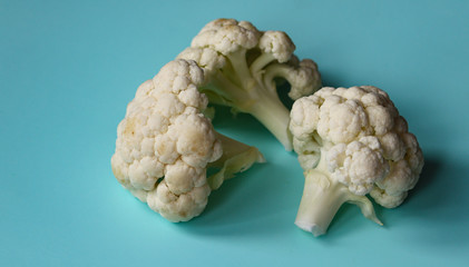 cauliflower inflorescences on a light background