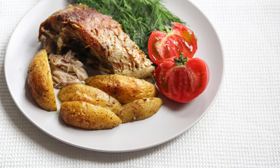 fried fish with vegetables on a plate