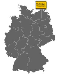 Landkarte von Deutschland mit Ortsschild von Mecklenburg-Vorpommern