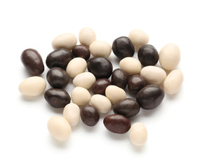 Tasty chocolate nuts on white background