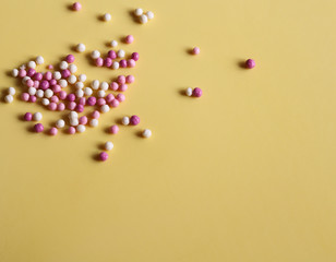 rice in multicolored chocolate on a light background