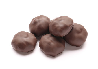 Tasty chocolate candies on white background