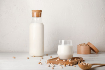 Tasty chickpea milk on white table