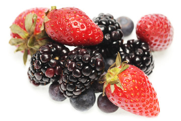 Group of fresh berries isolated on white