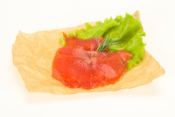 Sliced salmon fillet served rosemary