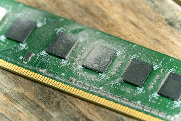 dusty DDR from motherboard. Service for repair and cleaning of computer equipment.