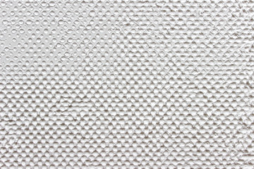 Creative white pattern with many dots on surface of natural polymer starch.
