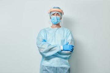 Doctor wearing surgical face mask and gloves.