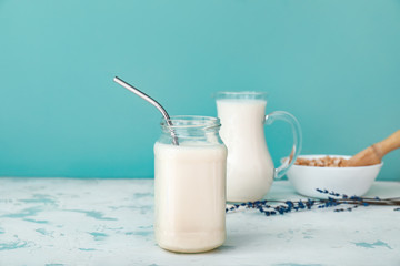 Jar of tasty milk on table