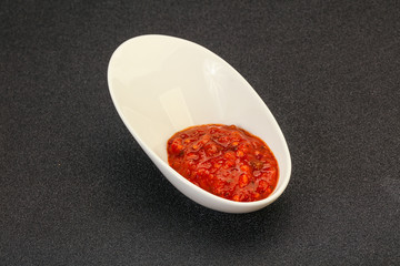 Tomato spicy sauce in the bowl
