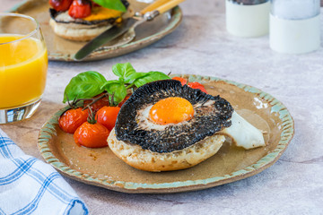 Baked egg and mushroom brunch with baby tomatoes