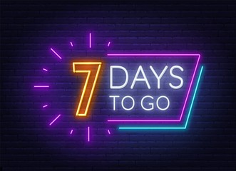 Seven days to go neon sign on brick wall background. Vector illustration.