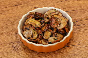 Roasted champignon with herbs and spices