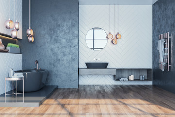 Modern gray bathroom interior with comfortable bathtub